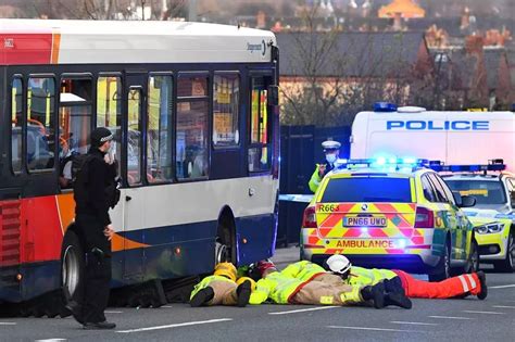 Passers By Desperately Try To Save Womans Life By Lifting Bus Off Her