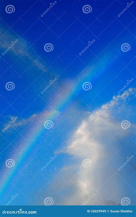 Blue skies and rainbows stock image. Image of rainbow - 26029949