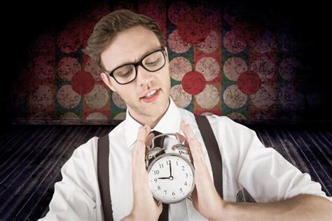 Premium Photo Geeky Businessman Holding Alarm Clock Against Purple