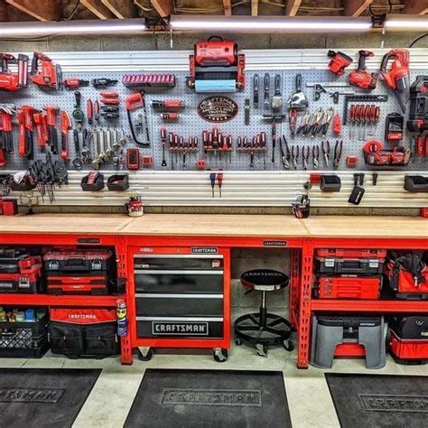 Craftsman Garage Design With Workbenches And Tools
