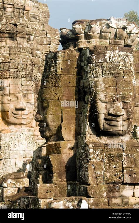 Stone Faces In The Bayon Temple At Angkor Wat In Cambodia Stock Photo