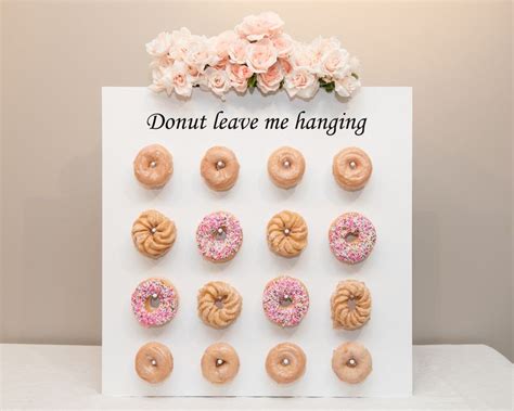 a card with doughnuts on it that says, donut leave me hanging