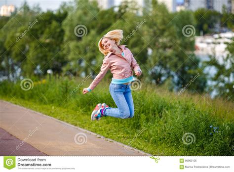 Woman Jumps And Smilling Stock Image Image Of Leap Beautiful 95962105