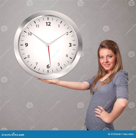 Attractive Lady Holding A Huge Clock Stock Photo Image Of Quartz