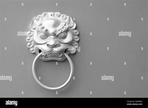 Traditional Chinese Door Knocker In Monochrome Stock Photo Alamy