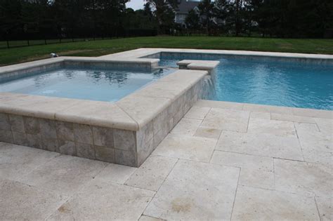 Elegant Ivory Tumbled Travertine Pavers Traditional Pool New York