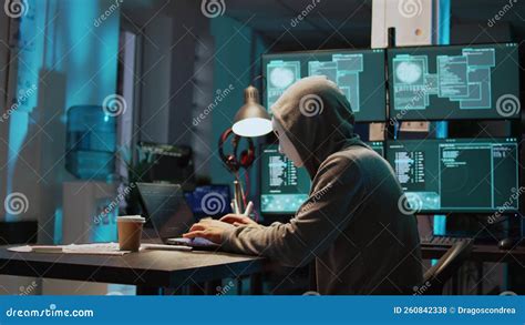 Masked Data Thief Hacking Computer Network At Night Stock Footage