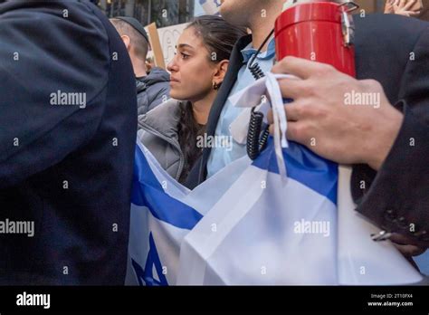 A Woman Gets Emotional And Sheds Tears At A Candlelight Vigil For