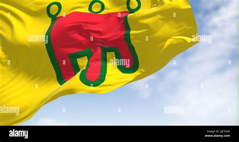 View of the Auvergne flag waving in the wind on a clear day. Auvergne ...