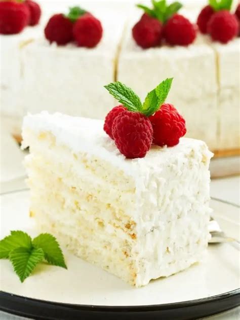 Amazing White Cake With Raspberry Filling And Whipped Cream Frosting