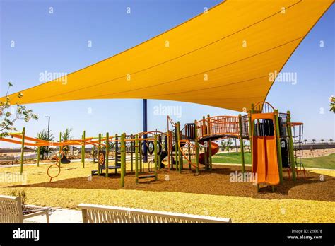 Childrens Playground Equipment Under Shade Canopy Stock Photo Alamy