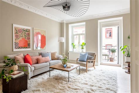 Light Gray Living Room With Red Accents