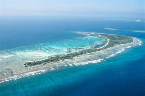 Premium Photo | Aerial view of a tropical island maldives photo