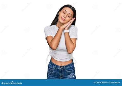 Young Hispanic Girl Wearing Casual White T Shirt Sleeping Tired