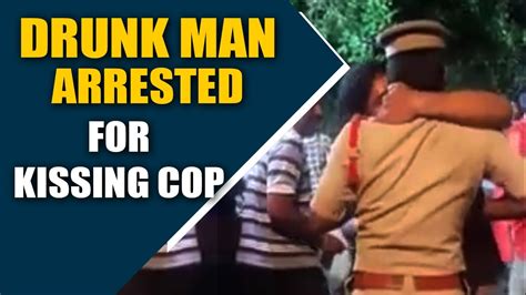 Drunk Man Kisses On Duty Cop Gets Booked Video Viral Oneindia News