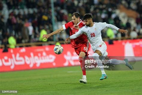 Maksim Osipenko of Russia in action against Mohammad Mohebi of Iran ...