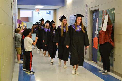 Guilford County seniors celebrate graduation with elementary students