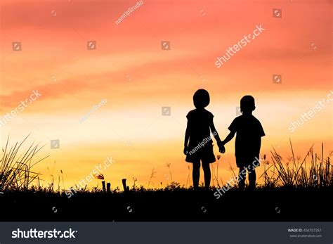 Silhouette Two Children Holding Hands On Stock Photo 456757351 | Shutterstock