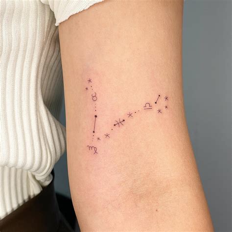 Pisces Constellation Tattoo On The Arm TheFab20s