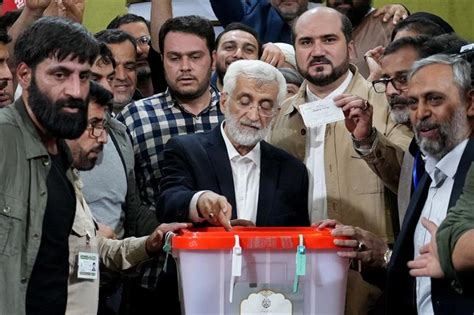 Iran Holds Runoff Presidential Vote Pitting Hard Line Former Negotiator