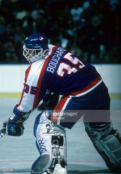 Goalie Dan Bouchard Of The Winnipeg Jets Passes The Puck During An