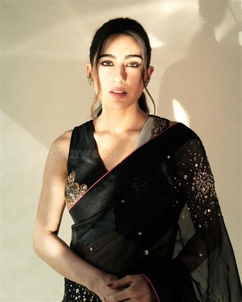 Bold Sara Ali Khan In A Black Embellished Sheer Saree With A Sleeveless Blouse Photos 02 303404