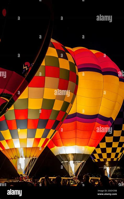 Illuminated Colorful Hot Air Balloons During Balloon Glow Albuquerque International Balloon