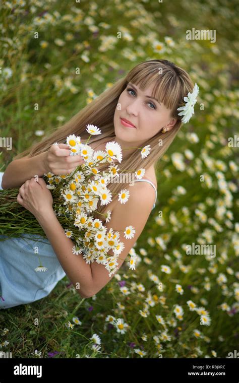 Beautiful Woman Enjoying Daisy Field Nice Female Lying Down In Meadow