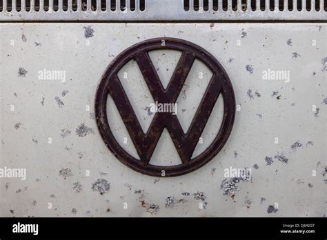 Volkswagen Vw Badge On The Front Of A Classic Vw Campervan Stock Photo