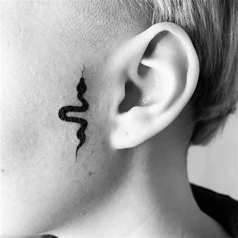 Share 74+ snake face tattoo - in.coedo.com.vn