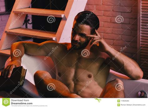 Sex And Relaxation Concept Man With Book And Thoughtful Face In