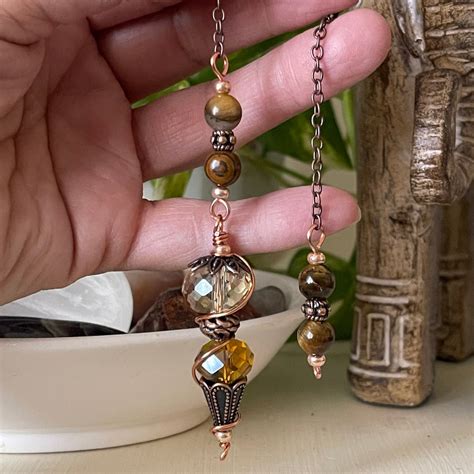 Faceted Crystal Dowsing Pendulum Tigers Eye Pendulum Copper Dowsing