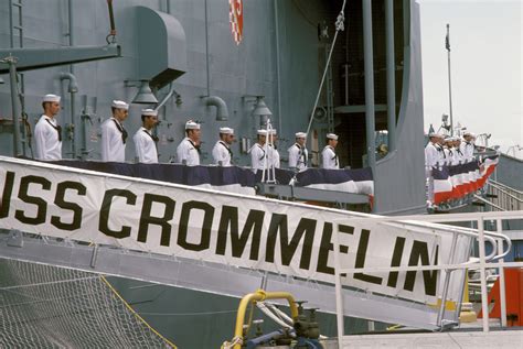 Members Of The Crew Man The Rail During The Commissioning Ceremony For