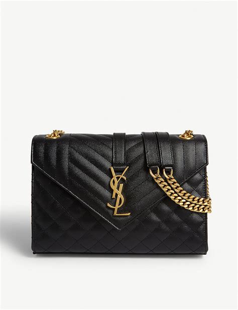 Saint Laurent Bolso Satchel De Cuero Acolchado Monograma Negro Oro