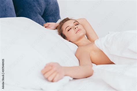 Beautiful Nude Woman Sleeping In Bed In Morning Adobe Stock