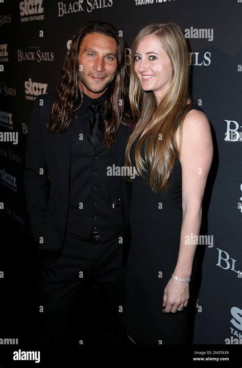 Zach McGowan Left And Emily Johnson Arrive At The Starz Black Sails