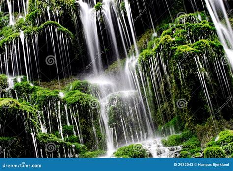 Green waterfall... stock image. Image of green, blurred - 2932043