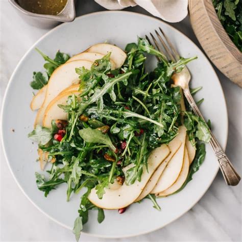 Arugula Pear Salad With Pistachios And Pomegranate Our Salty Kitchen