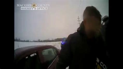 Michigan Deputy Shares Warm Embrace With Man Feeling Overwhelmed With