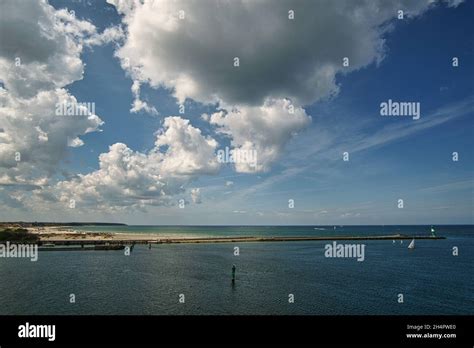 Rostock Harbor Exit View Over Warnem Nde The Beach And The Lighthouse