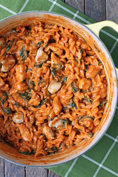 One Pot Creamy Tomato Pasta With Chicken And Spinach Emily Bites