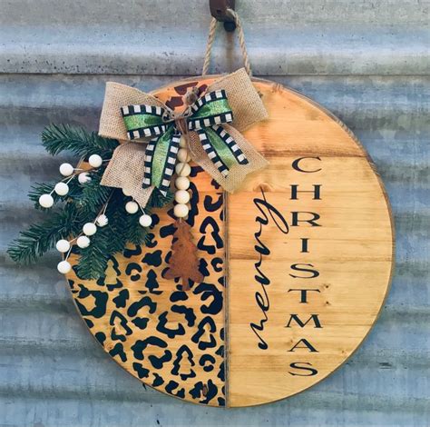 A Christmas Ornament Hanging On The Side Of A Building With A Leopard