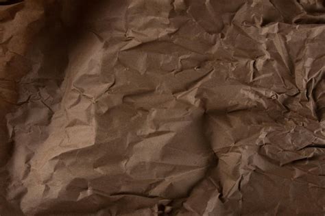 Premium Photo Crumpled Brown Paper Texture Wavy Textured Background