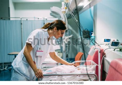 Female Doctor Examining Newborn Baby Hospital Stock Photo Edit Now