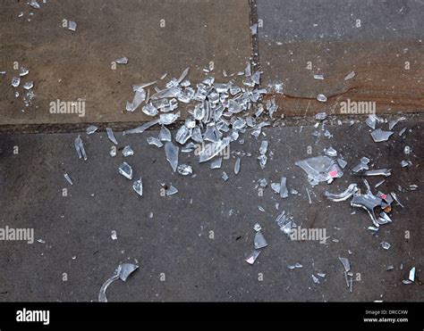 Broken Glass Pieces On Floor