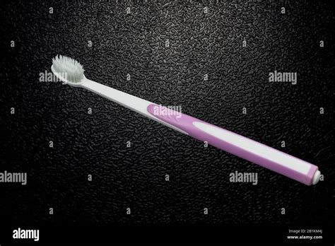 Toothbrush With White Bristles Stock Photo Alamy