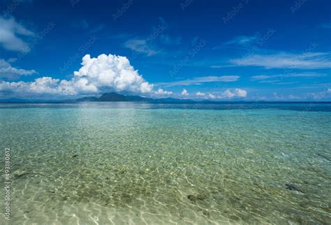 Beautiful Beach View With Clear Water And Blue Sky At Sibuan Island At