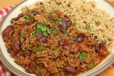 Chilli Con Carne with Brown Rice Stock Photo - Image of parsley, mexican: 33618894