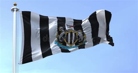 The Flag Of Newcastle United Waving In The Wind On A Clear Day Stock