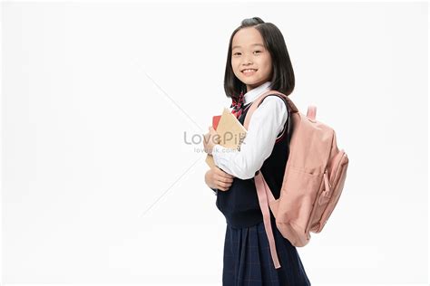 The Image Of A Pupil Carrying A Book In His Hand Picture And Hd Photos